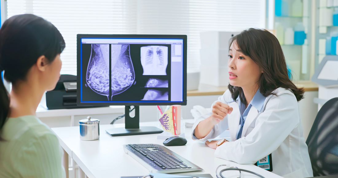 Female doctor is explaining mammography to woman patient