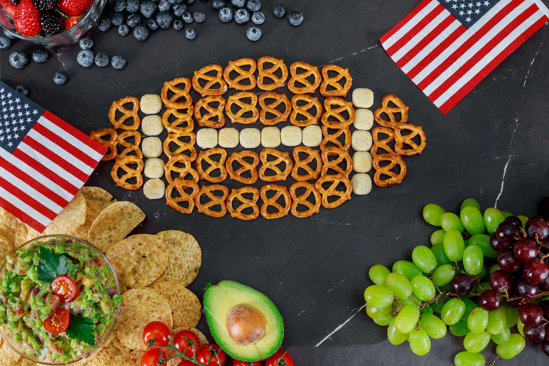 Table full of tasty healthy snacks for watching super bowl football game