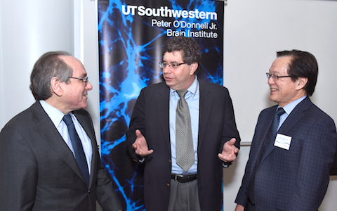From left, Dr. Daniel K. Podolsky, Dr. Michael Twery, and Dr. Takahashi catch up during the Circadian and Sleep Medicine Symposium. Dr. Twery, a guest speaker from the National Institutes of Health, is Director of the National Center on Sleep Disorders Research in the NIH’s National Heart, Lung, and Blood Institute.