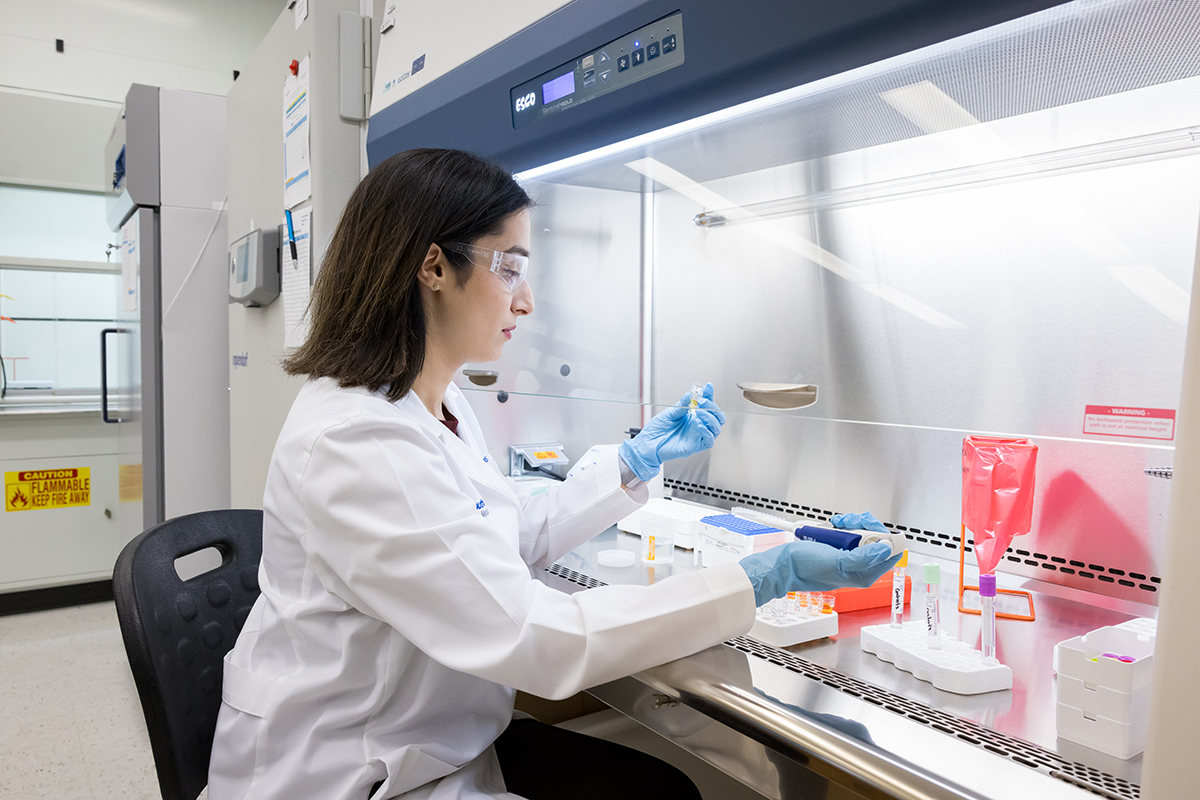 CMRU Lab member working in the Fume Hood