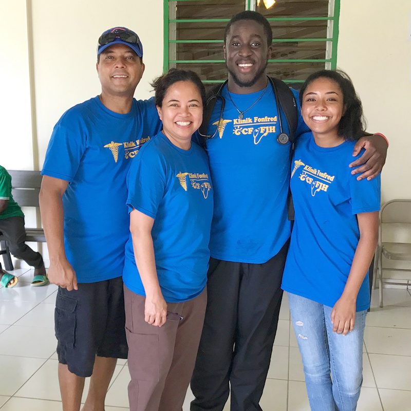 Mr. Adeyemi, on his last day in the clinic, with a family who were also part of the mission.