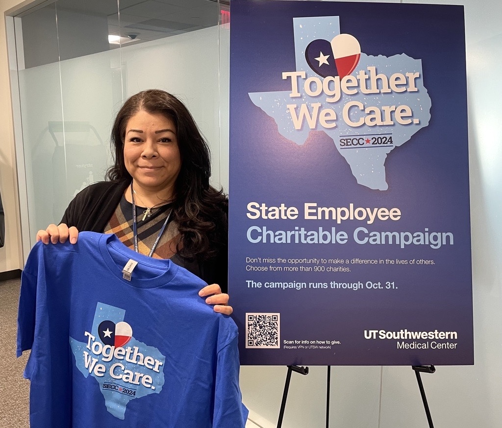 Linda Soliz, Administrative Assistant SR II, Health Sciences Digital Library and Learning Center holding secc shirt